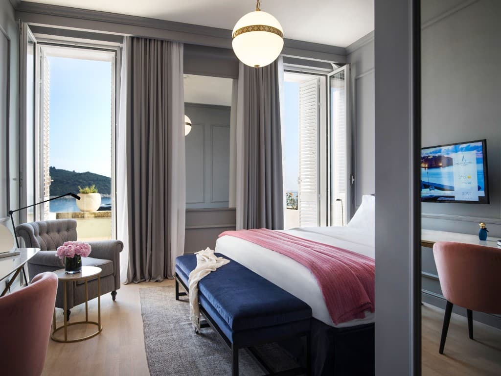 Hotel Excelsior — five-star polish with private sea access and wall views.